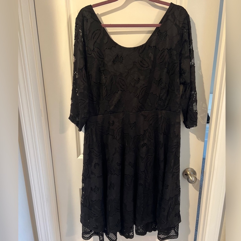 Black lace quarter sleeve fit and flare dress